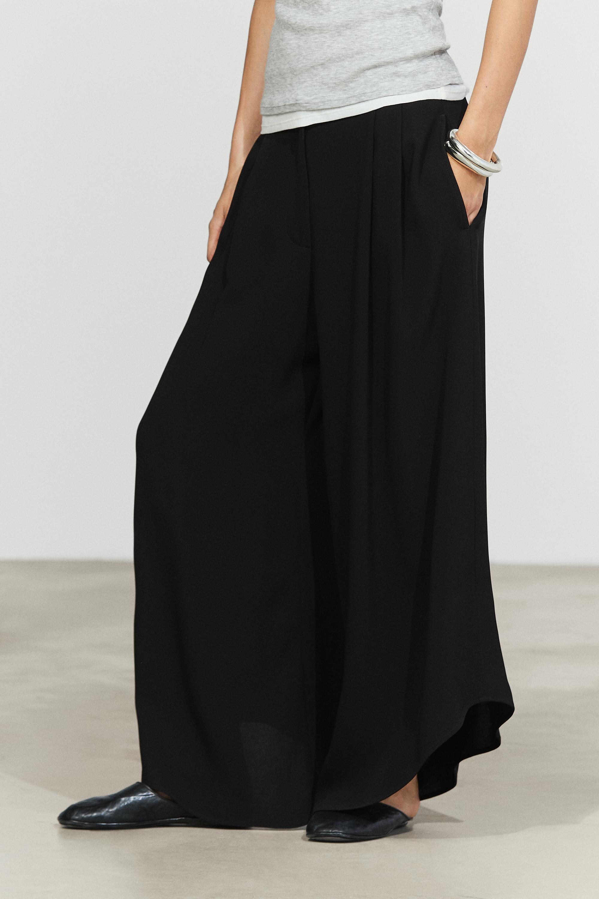 Pantalon large à plis